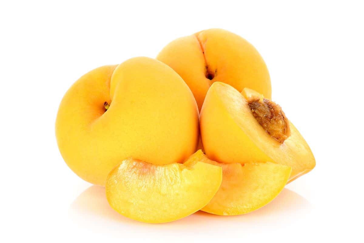 Halford peaches on a white background.