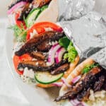 Portobello mushroom gyros in foil.