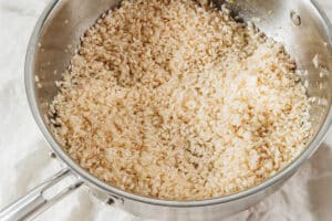 Toasting risotto rice.