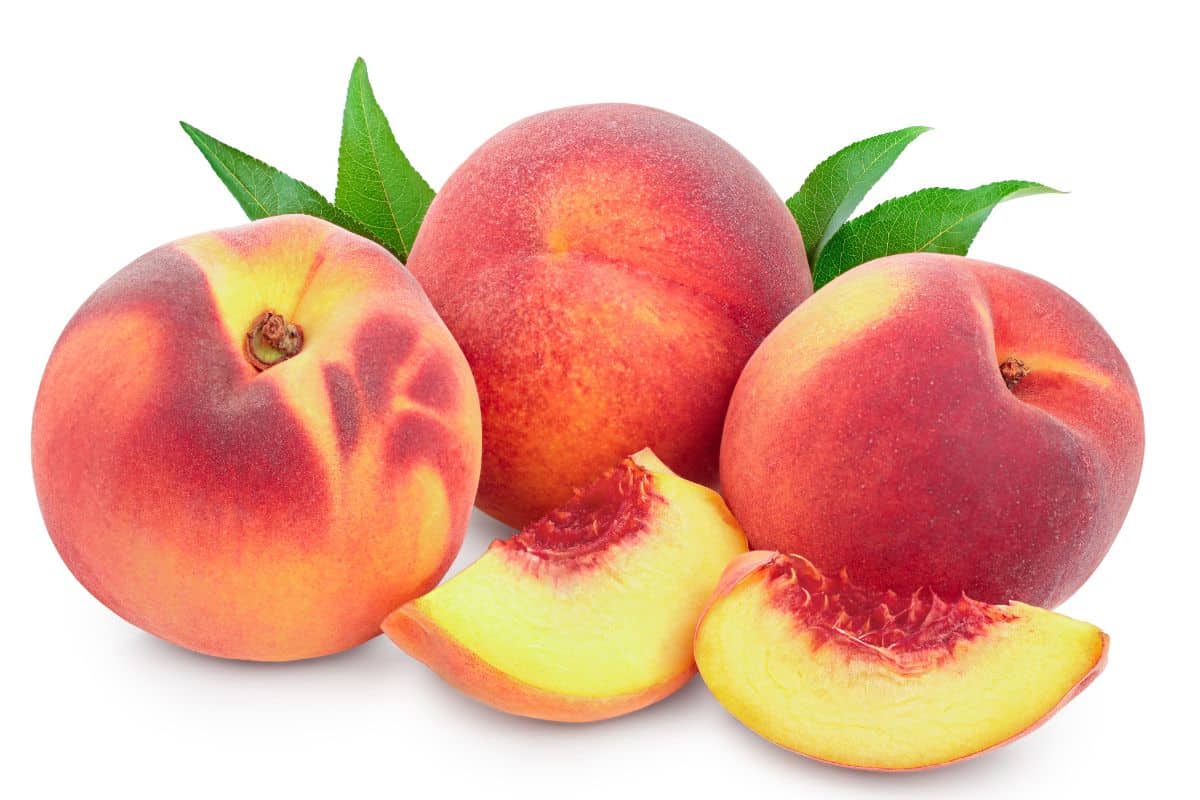 Redskin peaches on a white background.
