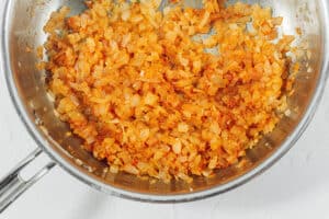 Sautéed onions in a pan.