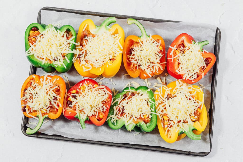 Uncooked stuffed peppers.