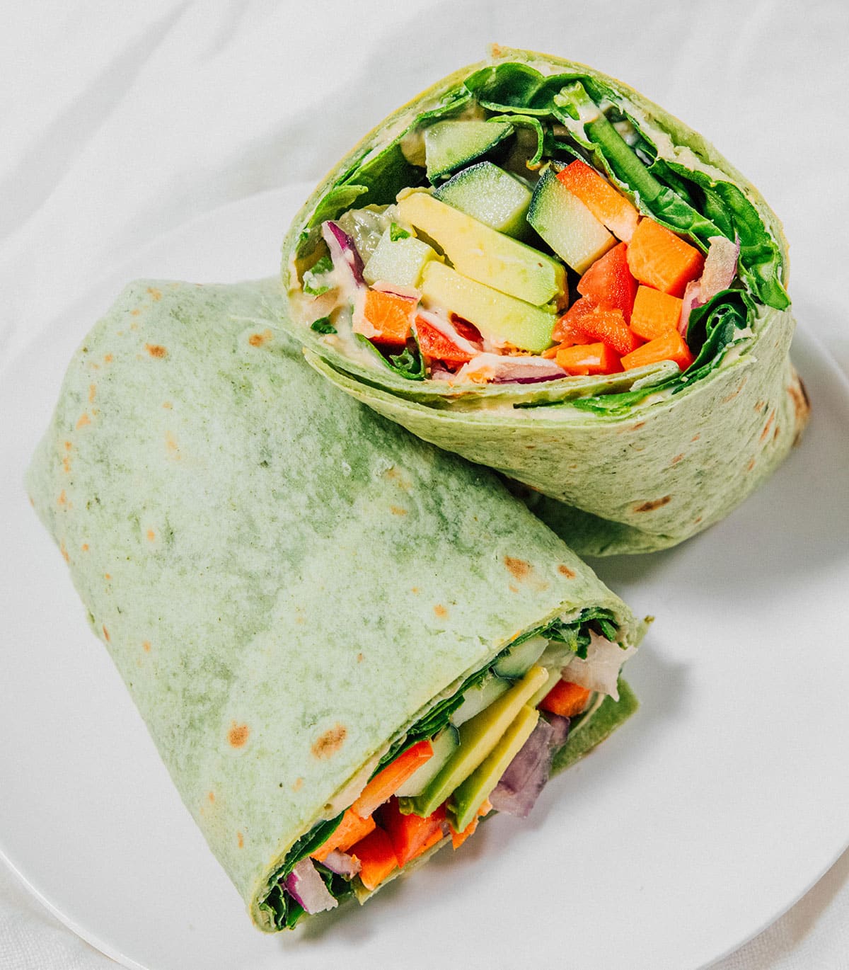 Veggie wraps cut and stacked.
