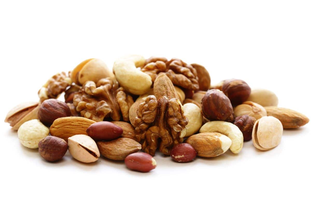 Different types of nuts on a white background.
