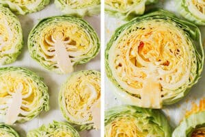 Cabbage steaks on a baking sheet before cooking.