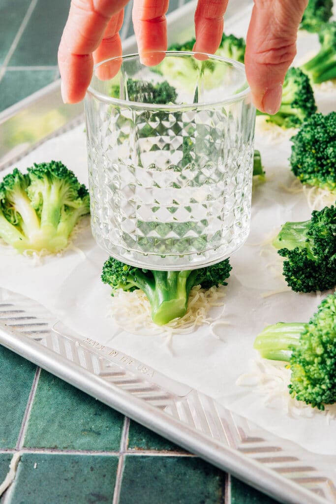 Smashing broccoli with a glass.