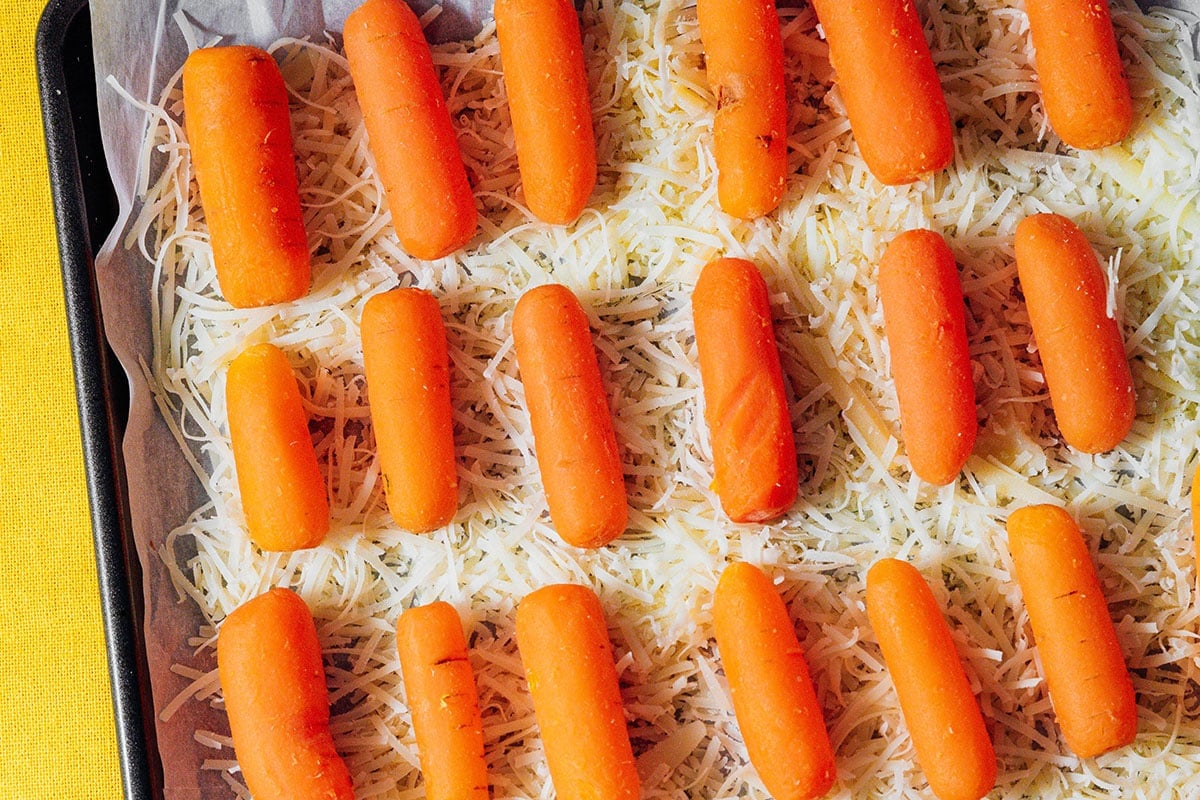 Carrots on a pan with parmesan.
