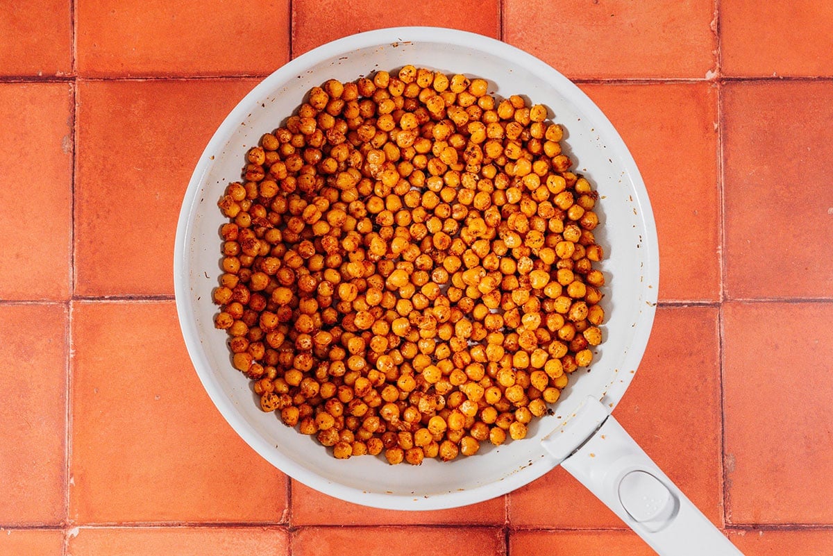 Chickpeas in a saute pan.