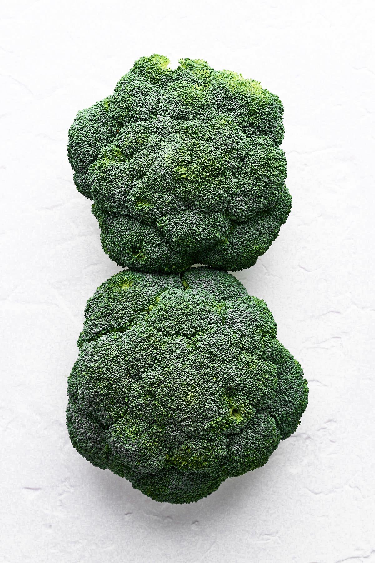Two large heads of broccoli.