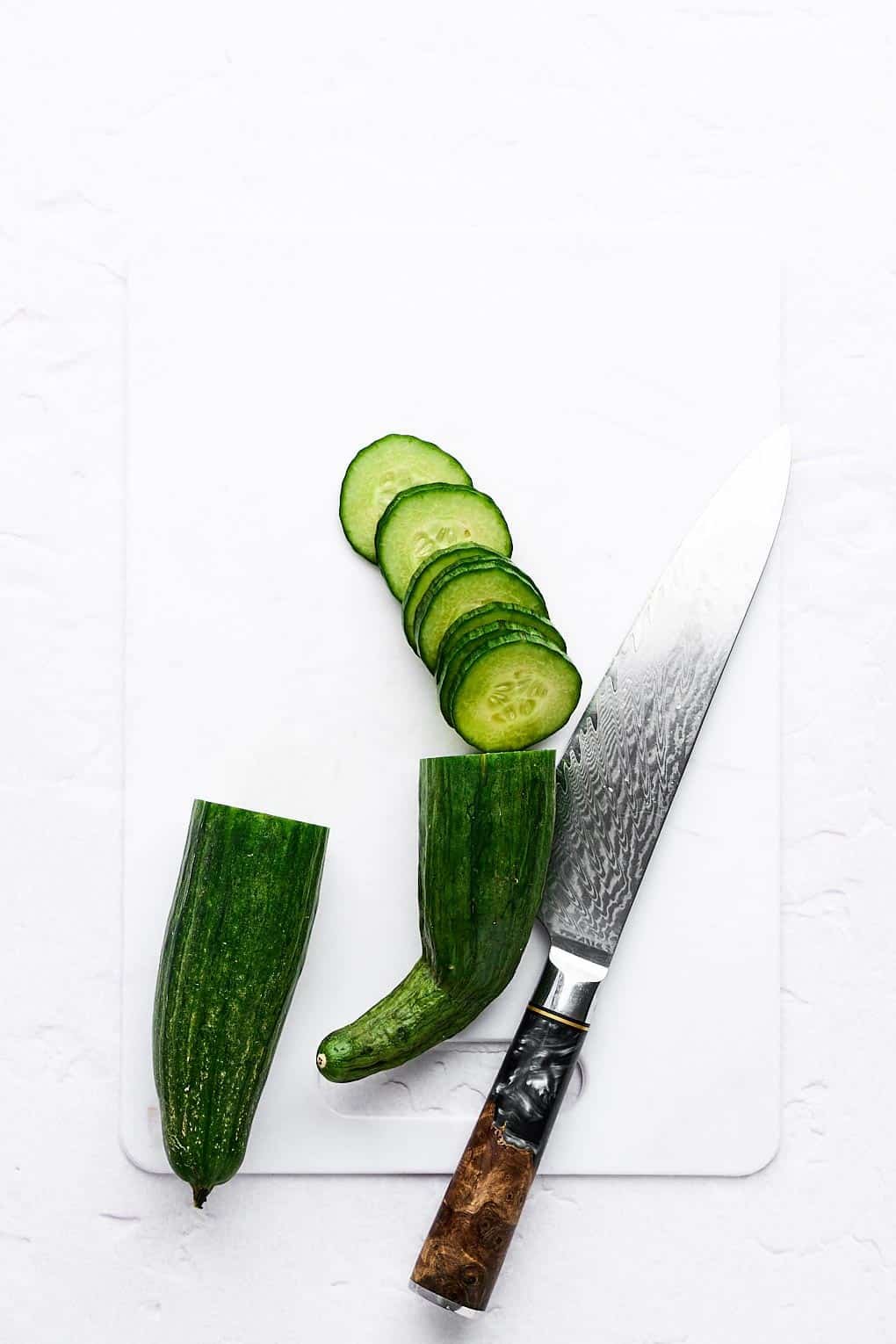 Cutting a cucumber.