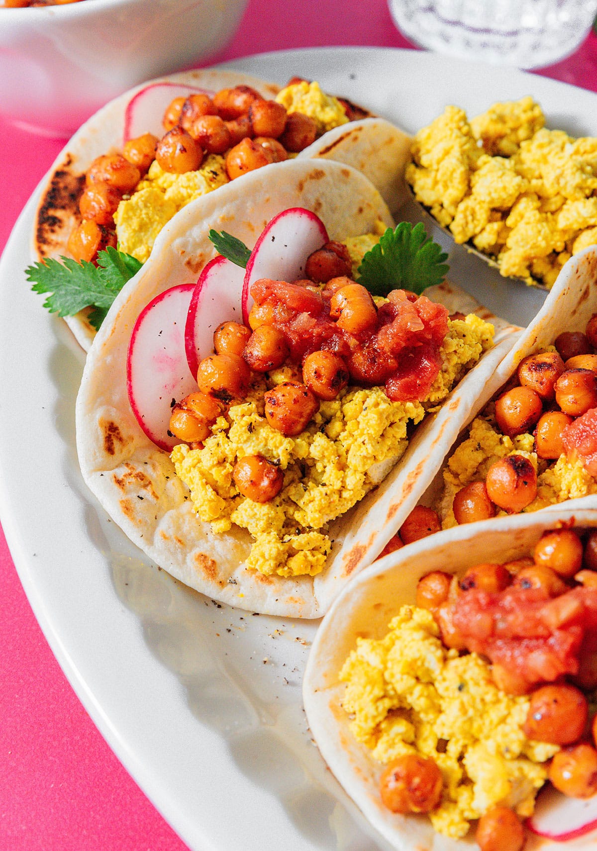 Vegan breakfast tacos on a platter.