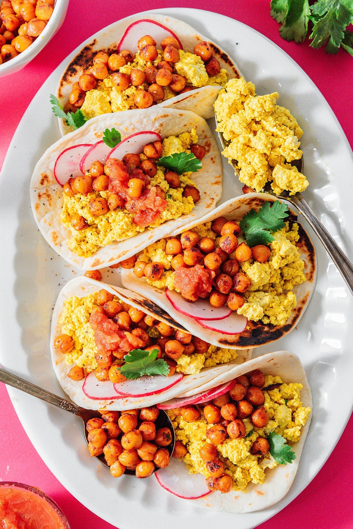 Vegan breakfast tacos on a platter.