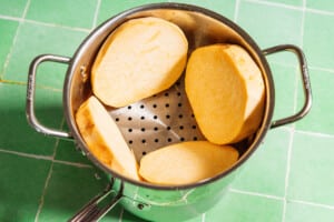Steaming rutabaga.