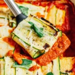 Zucchini ravioli on a spatula.