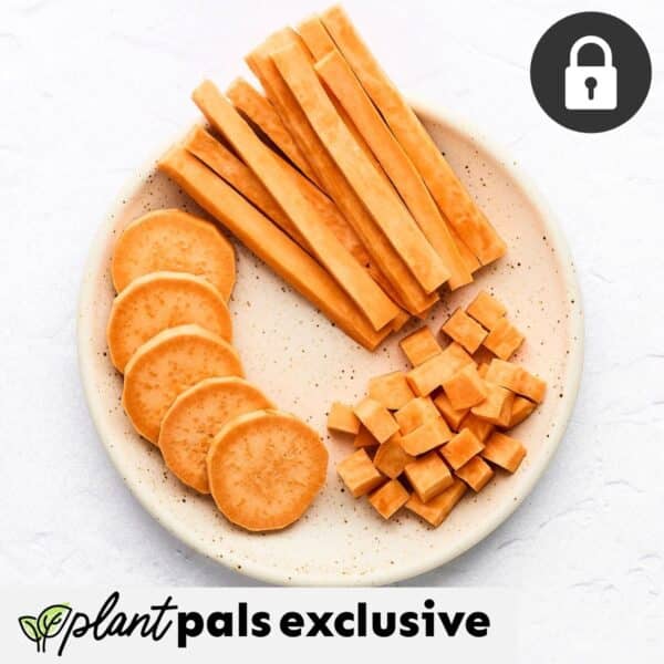 A plate with sliced, cubed, and stick-shaped pieces of orange sweet potato demonstrates how to cut sweet potatoes. A plant pals exclusive label and a lock icon are also visible.