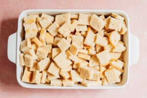 Bread cubes in a casserole dish.