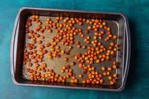 Roasted chickpeas in a pan.