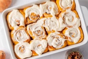 Sweet potato cinnamon rolls in a casserole dish.