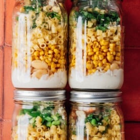 Street corn pasta salad in jars.