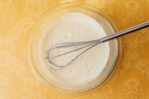 Whisked eggs in a bowl.