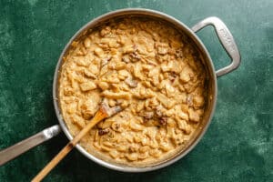 A pan filled braised butter beans.